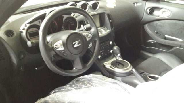 Nissan 370Z 2009 - Cần bán Nissan 370Z 2009, màu trắng, xe nhập