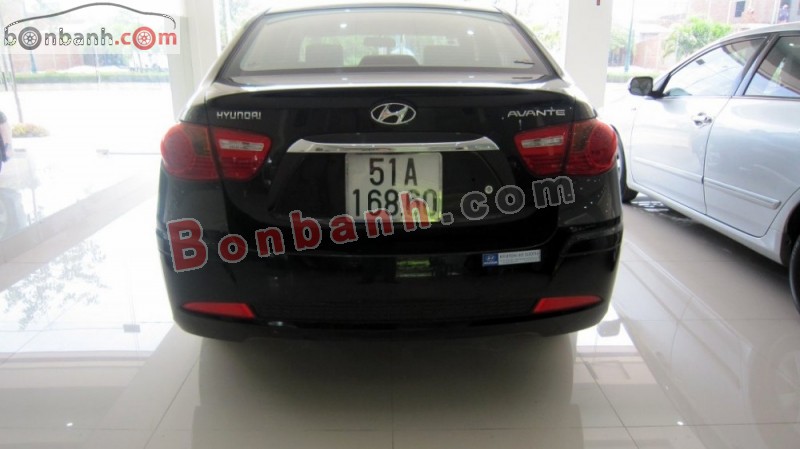 Hyundai Avante 1.6 AT 2011 - Bán Hyundai Avante 1.6 AT đời 2011, màu đen chính chủ, 480 triệu