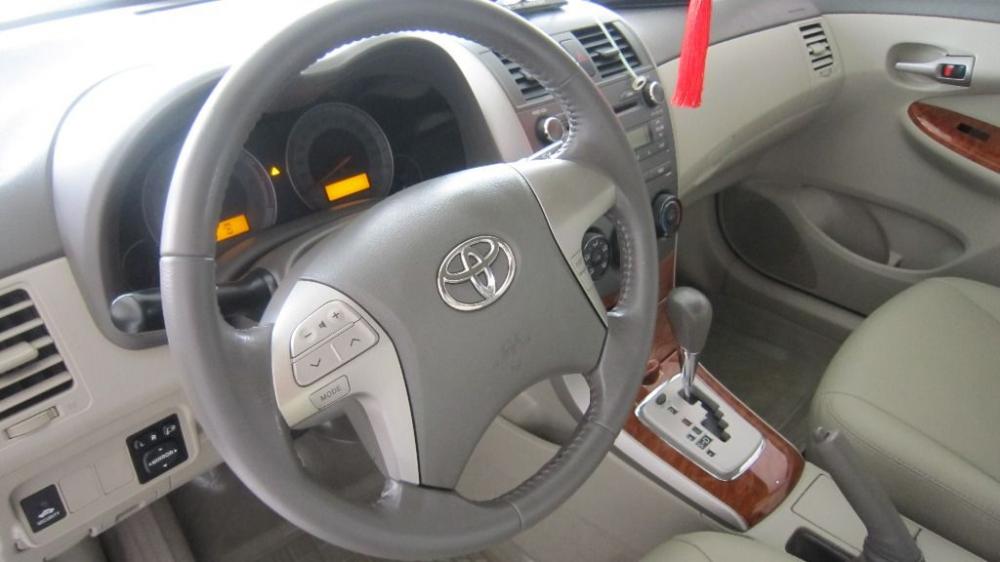 Toyota Corolla altis 1.8 AT  2010 - Bán ô tô Toyota Corolla altis 1.8 AT sản xuất 2010, màu bạc chính chủ