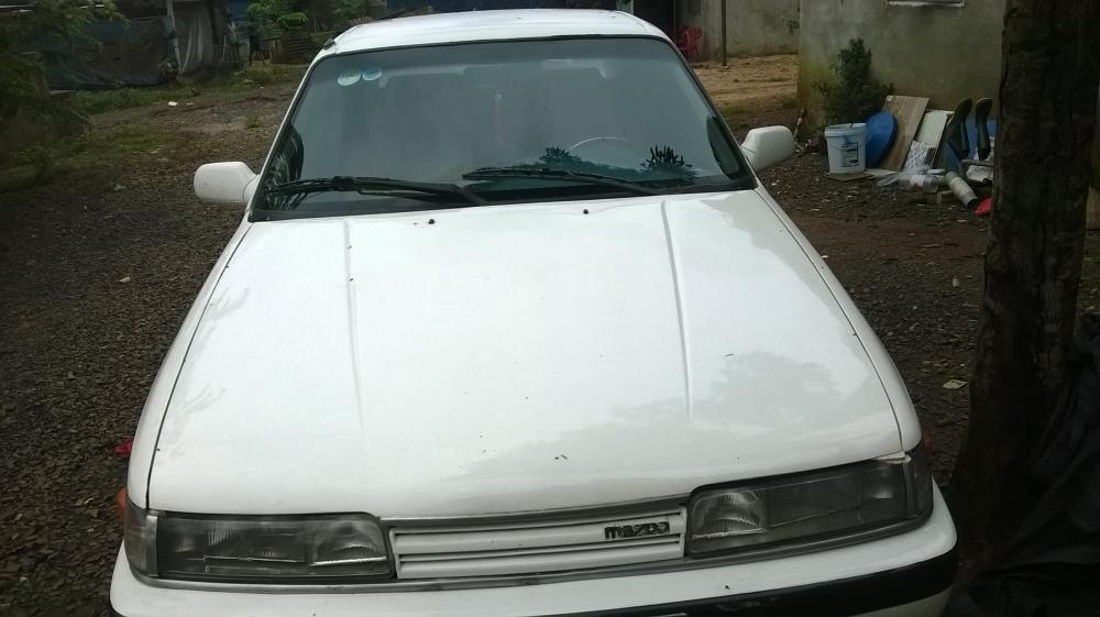 Mazda 323 1989 - Cần bán xe Mazda 323 đời 1989, màu trắng, nhập khẩu