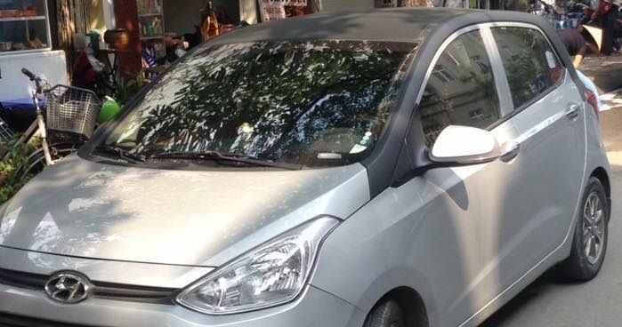 Hyundai i10   2014 - Cần bán xe cũ Hyundai i10 đời 2014, màu bạc số sàn giá cạnh tranh