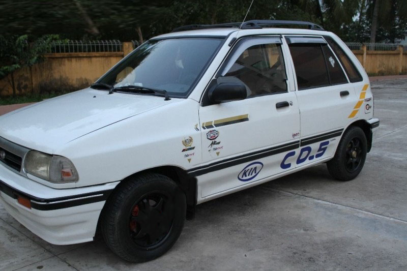 Kia CD5   2003 - Cần bán Kia CD5 đời 2003, màu trắng giá cạnh tranh