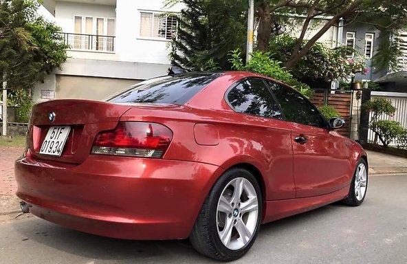 BMW 1 Series 128i 2010 - Cần bán gấp BMW 128i đời 2010, màu đỏ xe gia đình giá cạnh tranh