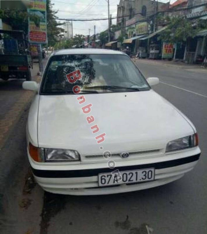 Mazda 323 1995 - Bán ô tô Mazda 323 đời 1995, màu trắng 