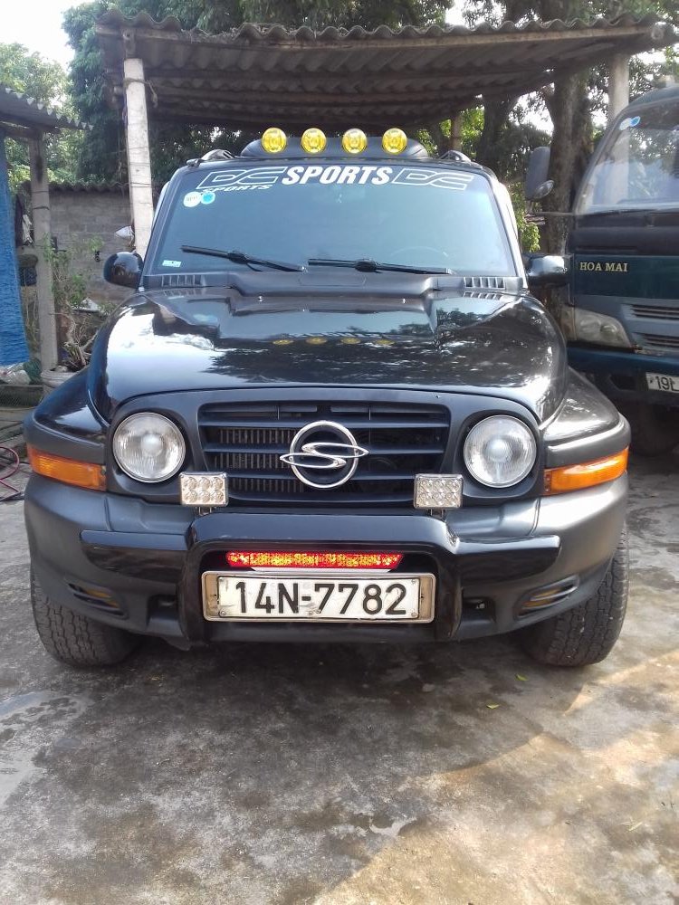 Ssangyong Korando 2004 - Cần bán xe Ssangyong Korando năm 2004, màu đen, nhập khẩu nguyên chiếc