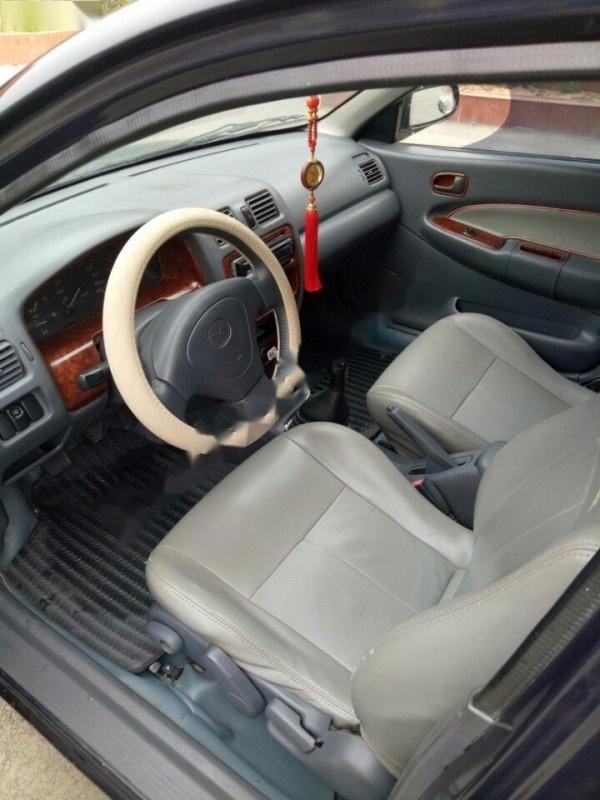 Mazda 323F   1999 - Cần bán gấp Mazda 323F đời 1999, màu đen, nhập khẩu