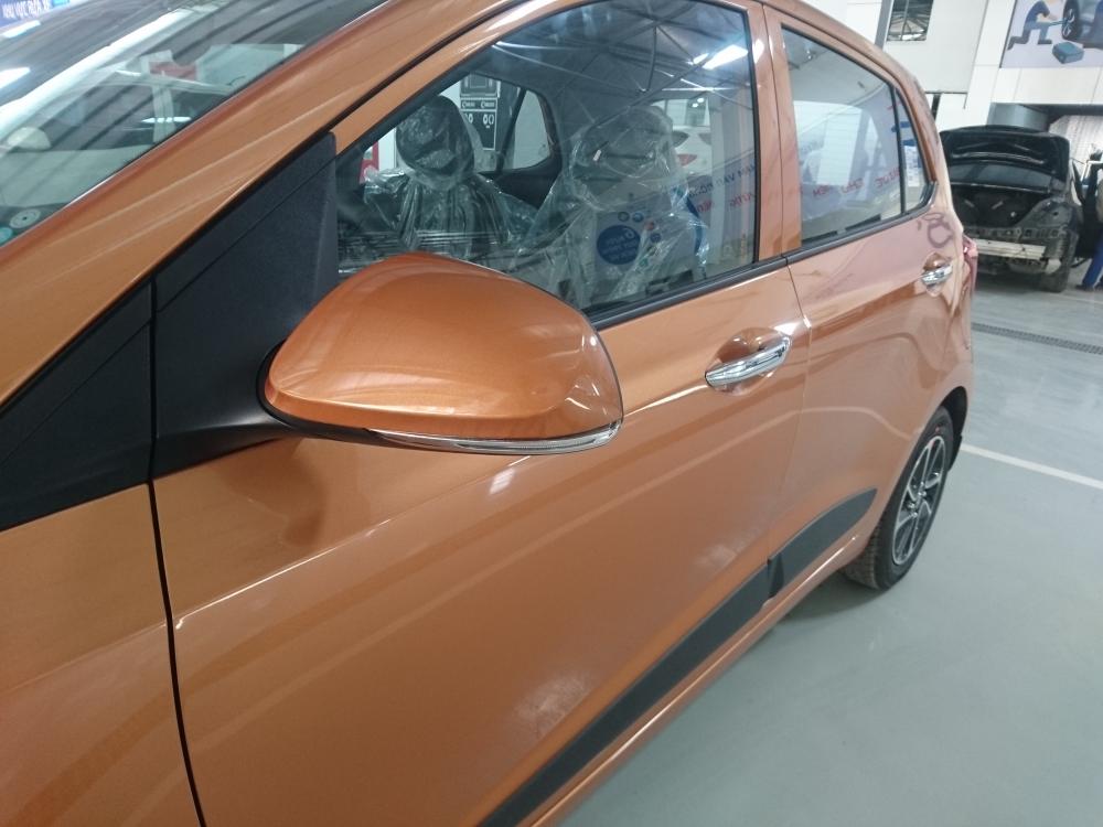 Hyundai Grand i10 2018 - Bán xe Hyundai Grand i10 sx 2018 màu cam bản đủ, giá tốt nhất. LH 090.467.5566