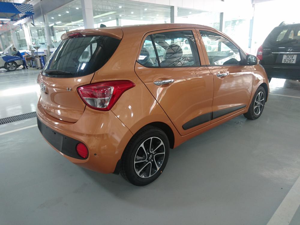 Hyundai Grand i10 2018 - Bán xe Hyundai Grand i10 sx 2018 màu cam bản đủ, giá tốt nhất. LH 090.467.5566