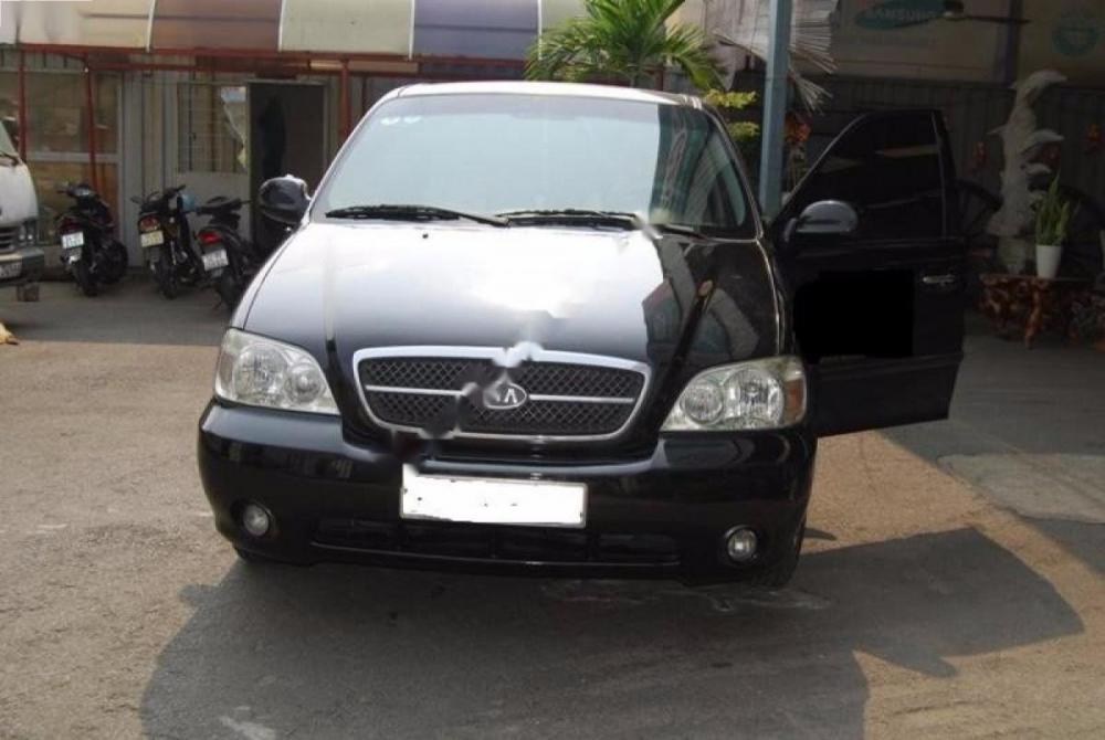 Kia Carnival GS 2007 - Bán xe Kia Carnival GS đời 2007, màu đen ít sử dụng giá cạnh tranh