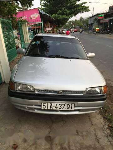 Mazda 323   1995 - Bán xe cũ Mazda 323 đời 1995, màu bạc xe gia đình