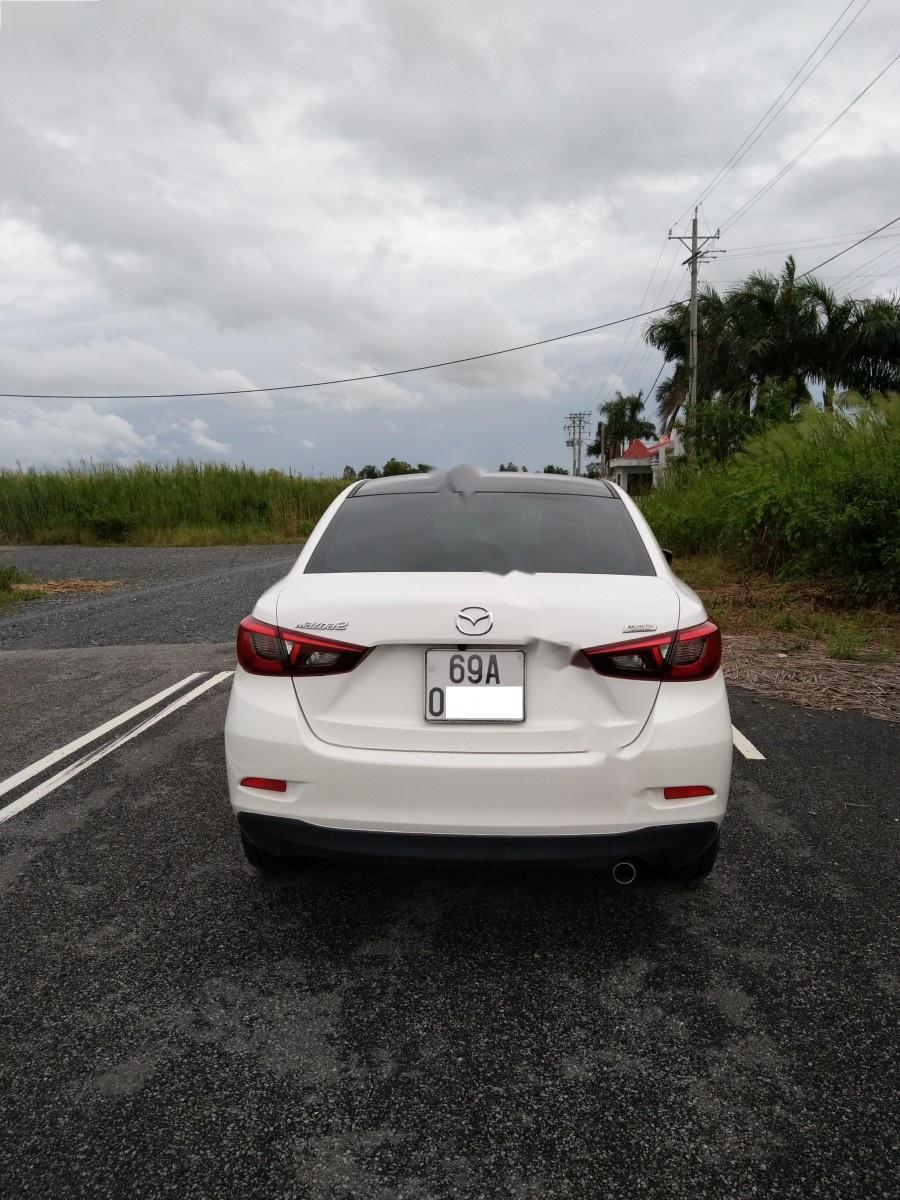 Mazda 2 1.5AT 2015 - Xe Mazda 2 1.5AT đời 2015, màu trắng số tự động, 545 triệu