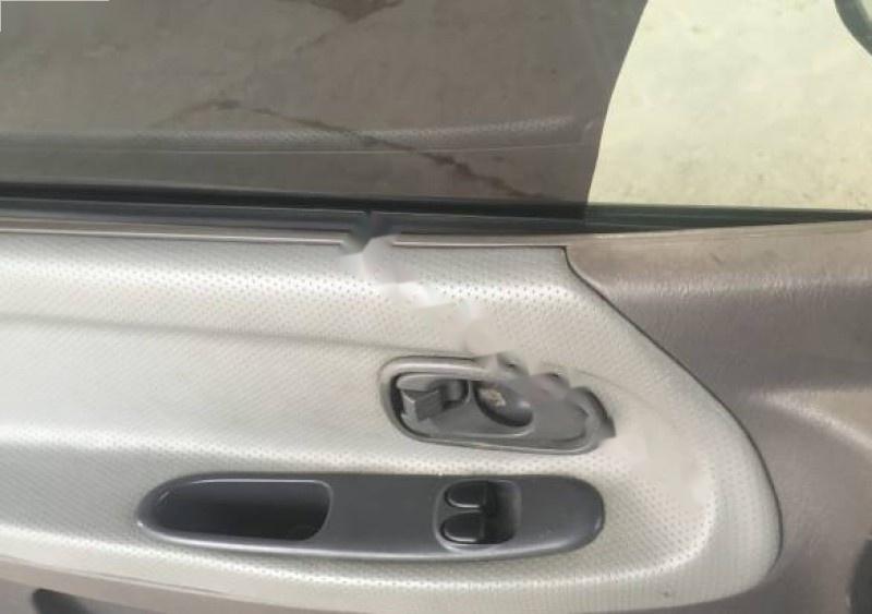 Kia Carnival 2001 - Cần bán xe Kia Carnival đời 2001, màu bạc, nhập khẩu giá cạnh tranh
