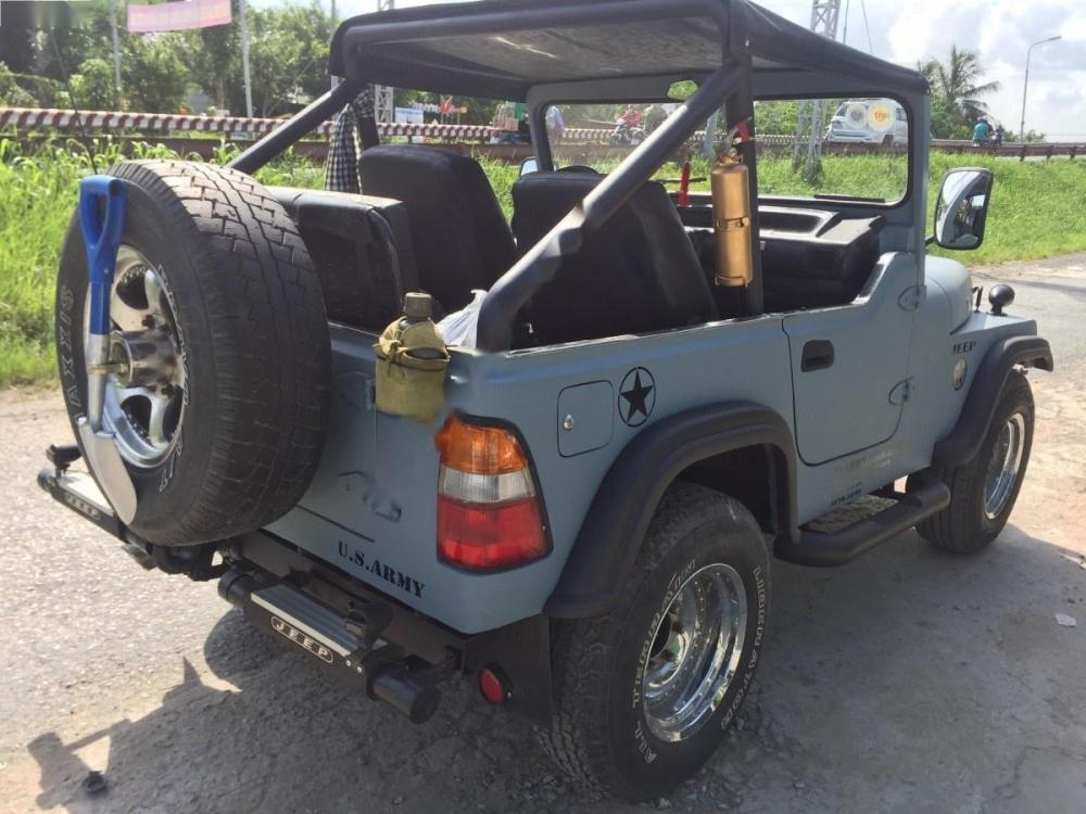 Jeep CJ 2.4MT  1990 - Cần bán lại xe Jeep CJ 2.4MT đời trước 1990, màu xám, nhập khẩu nguyên chiếc chính chủ, 165 triệu