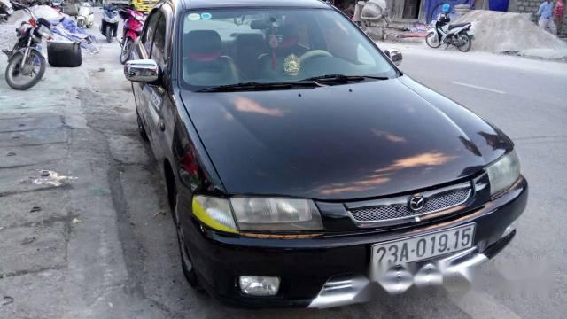 Mazda 323 1999 - Bán Mazda 323 năm 1999, màu đen xe gia đình, giá chỉ 145 triệu