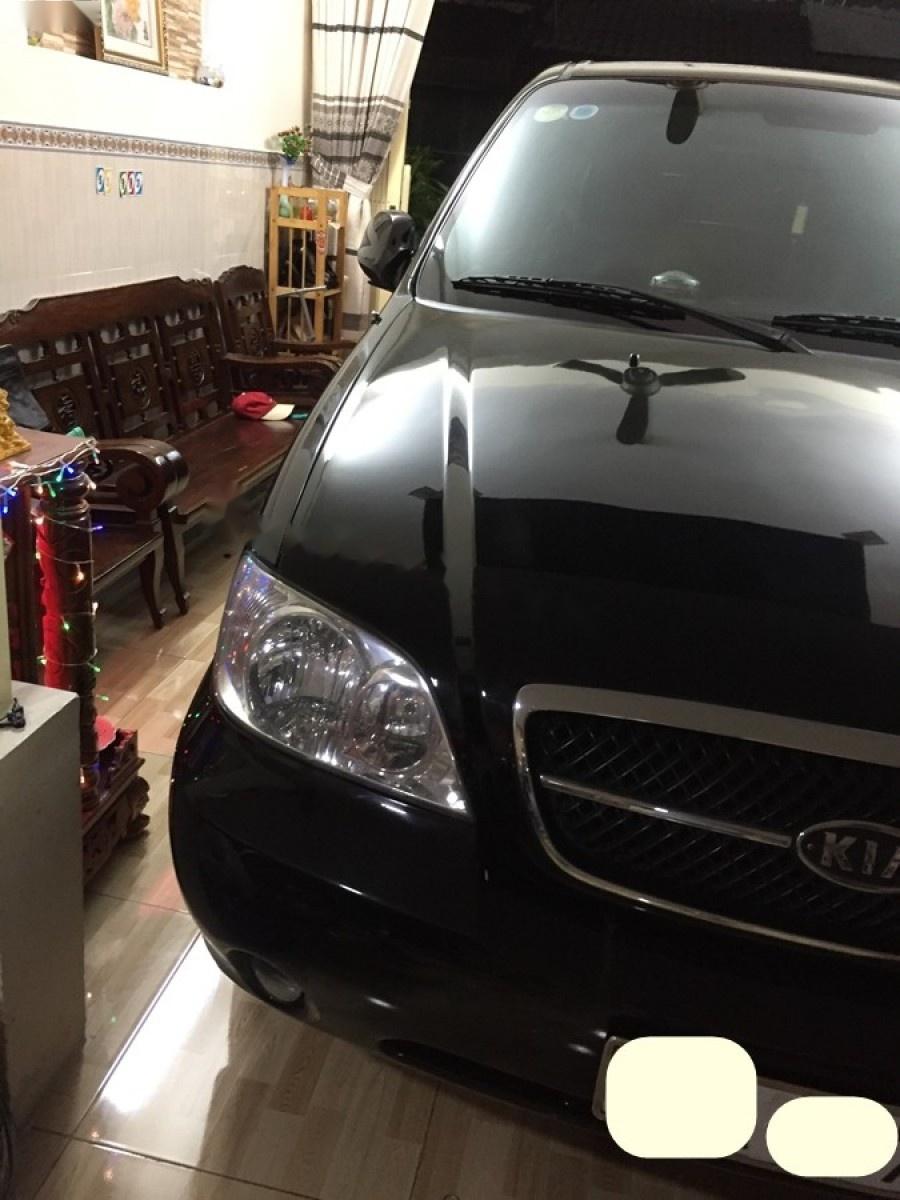 Kia Carnival GS 2006 - Bán Kia Carnival GS đời 2006, màu đen như mới, giá 255tr