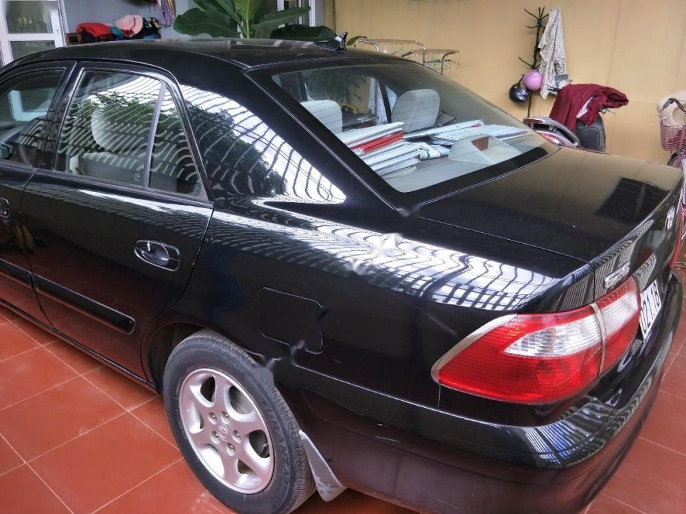 Mazda 626    2003 - Cần bán Mazda 626 đời 2003, màu đen, nhập khẩu nguyên chiếc