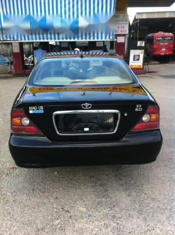 Daewoo Magnus 2004 - Bán xe Daewoo Magnus đời 2004, màu đen còn mới