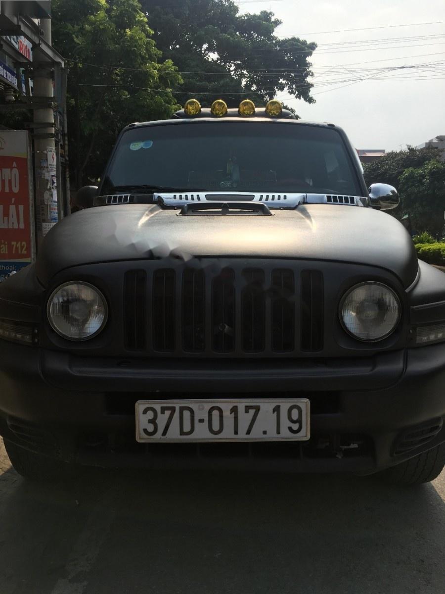 Ssangyong Korando 2003 - Cần bán xe Ssangyong Korando năm 2003, màu đen, xe nhập, 165 triệu