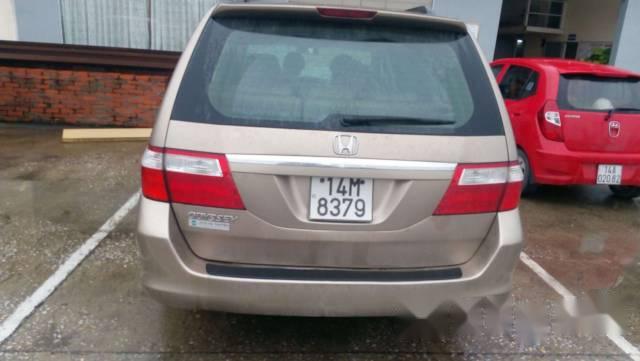 Honda Odyssey 2006 - Cần bán Honda Odyssey sản xuất 2006, màu ghi vàng  