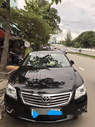 Toyota Camry 2.4G 2011 - Cần bán gấp Toyota Camry 2.4G sản xuất 2011, màu đen chính chủ