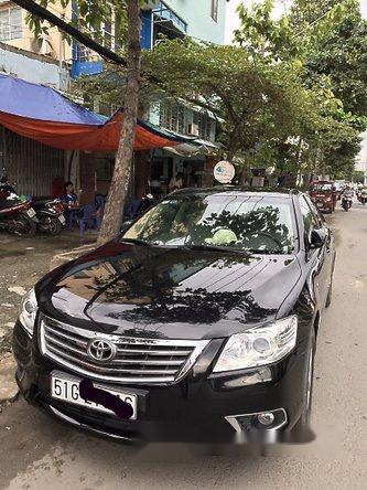 Toyota Camry 2.4G 2011 - Cần bán gấp Toyota Camry 2.4G sản xuất 2011, màu đen chính chủ