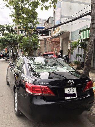 Toyota Camry 2.4G 2011 - Cần bán gấp Toyota Camry 2.4G sản xuất 2011, màu đen chính chủ