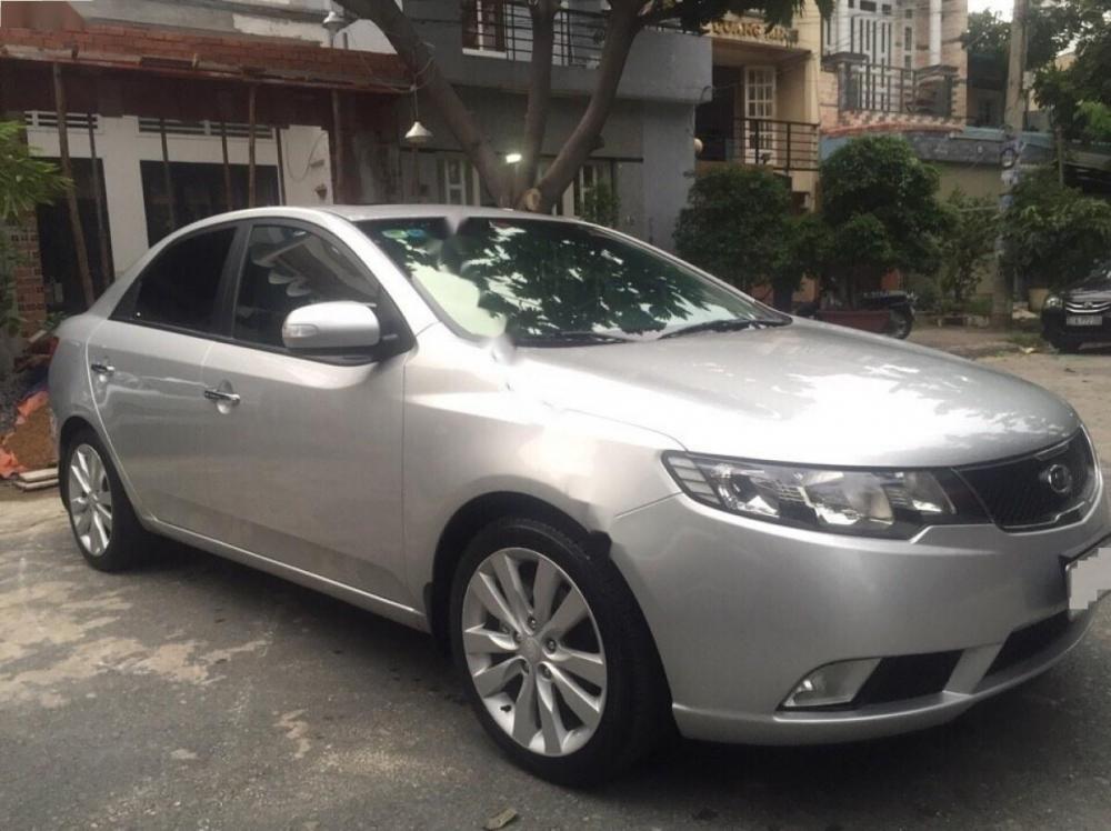 Kia Forte EX 2010 - Cần bán lại xe Kia Forte EX đời 2010, màu bạc còn mới