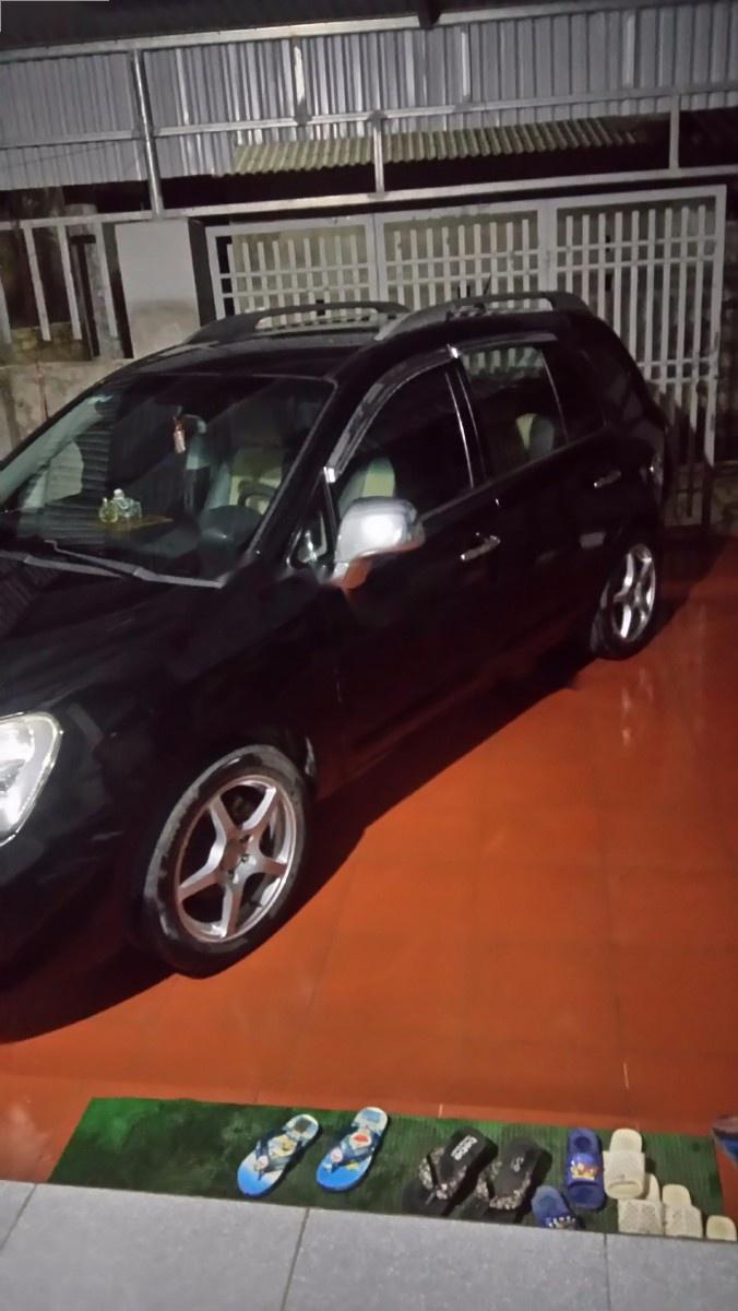 Kia Carens 2010 - Bán Kia Carens đời 2010, màu đen
