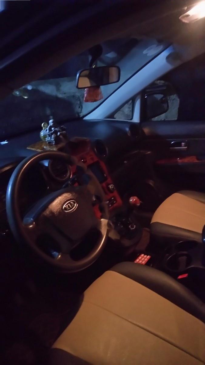 Kia Carens 2010 - Bán Kia Carens đời 2010, màu đen