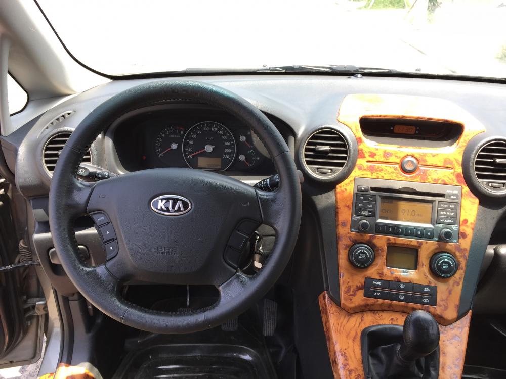 Kia Carens EX 2010 - Bán ô tô Kia Carens EX đời 2010, màu xám số sàn, 342tr