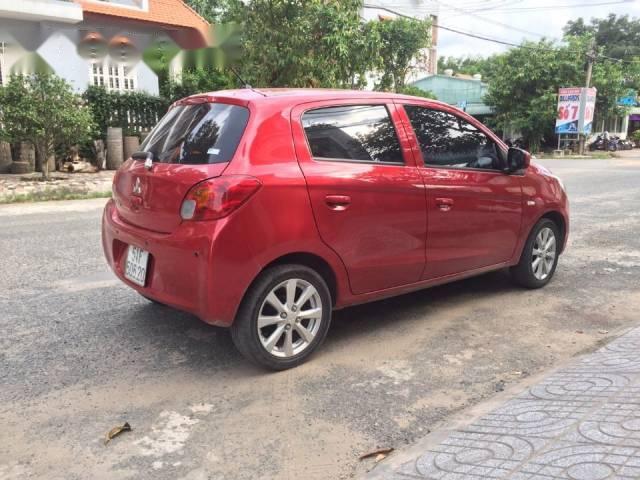 Mitsubishi Mirage MT 2015 - Cần bán lại xe Mitsubishi Mirage MT đời 2015, màu đỏ, nhập khẩu nguyên chiếc, giá 347tr