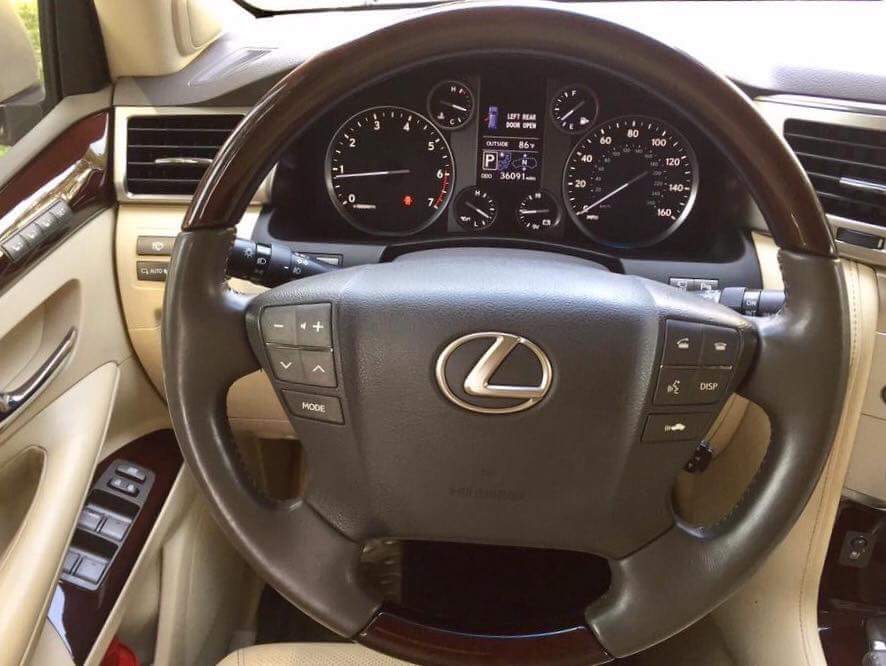 Lexus LX 570 2012 - Bán xe Lexus LX 570 năm 2012, màu vàng cát, xe nhập Mỹ đăng ký 2013 tư nhân