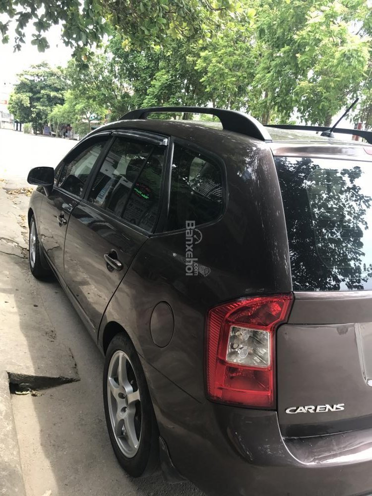 Kia Carens EX 2010 - Bán Kia Carens EX đời 2010, màu nâu như mới