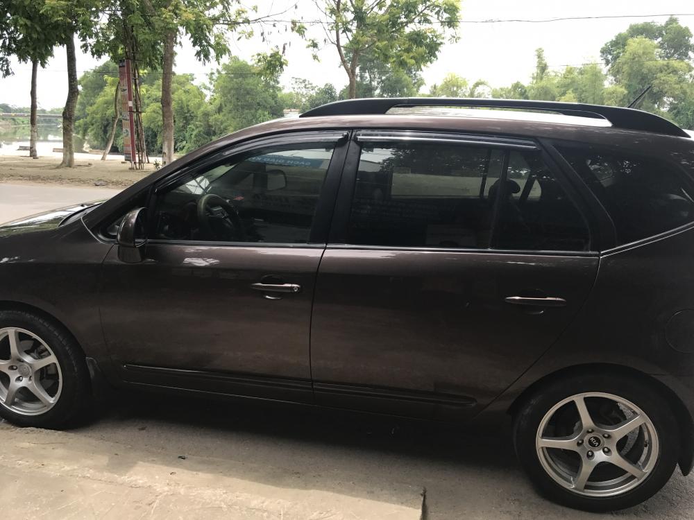 Kia Carens EX 2010 - Bán Kia Carens EX đời 2010, màu nâu như mới