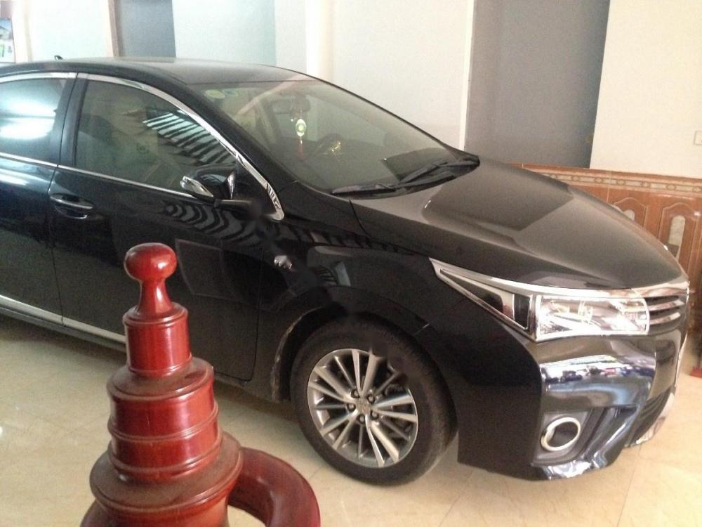 Toyota Corolla altis 1.8G AT 2015 - Cần bán gấp Toyota Corolla altis 1.8G AT đời 2015, màu đen