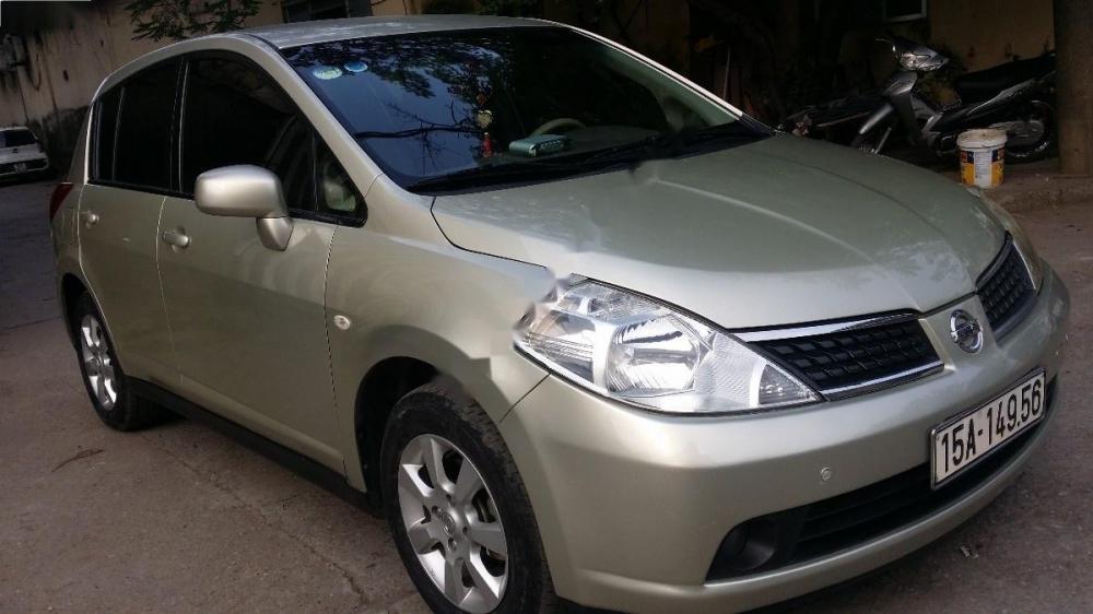 Nissan Tiida 1.8AT 2009 - Bán Nissan Tiida 1.8AT đời 2009, màu vàng, xe nhập