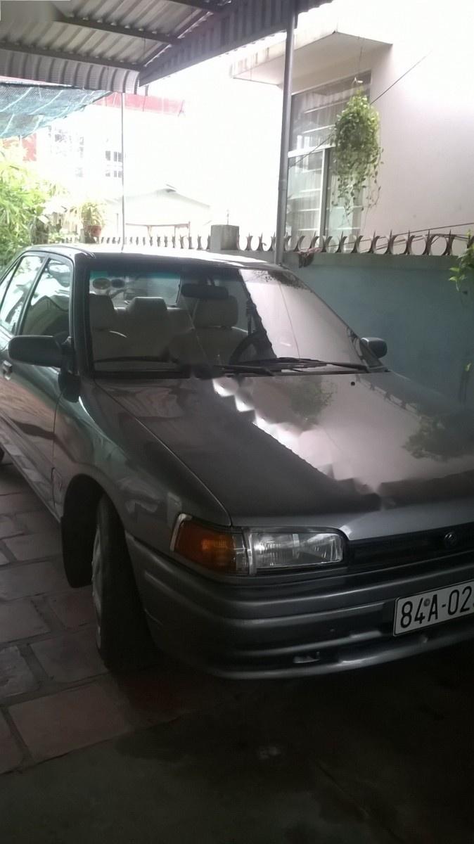 Mazda 323 1.6 MT 1995 - Bán Mazda 323 1.6 MT sản xuất 1995, màu xám, giá chỉ 90 triệu