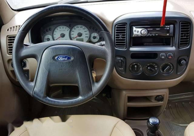 Ford Escape 2003 - Cần bán gấp Ford Escape sản xuất 2003, màu đen số sàn