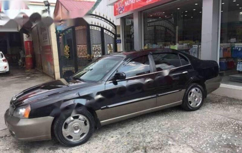 Daewoo Magnus 2.5AT 2005 - Bán xe Daewoo Magnus 2.5AT đời 2005, màu đen, xe nhập, giá 145tr