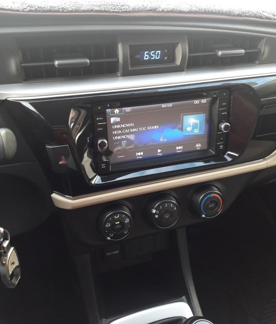 Toyota Corolla altis 1.8G MT 2014 - Bán Toyota Corolla altis 1.8G MT đời 2014, màu đen xe gia đình
