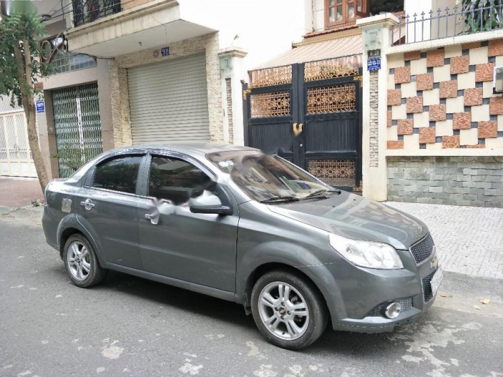 Chevrolet Aveo 1.5 LTZ 2014 - Cần bán gấp Chevrolet Aveo 1.5 LTZ năm 2014, màu xám số tự động, giá 325tr