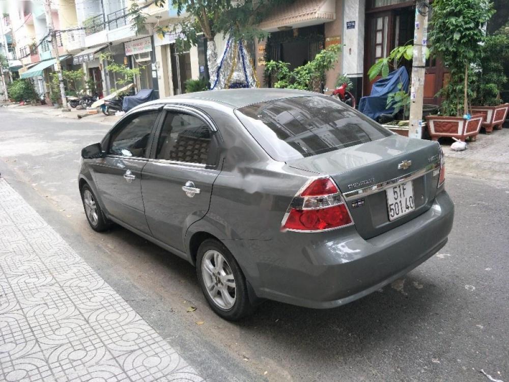 Chevrolet Aveo 1.5 LTZ 2014 - Cần bán gấp Chevrolet Aveo 1.5 LTZ năm 2014, màu xám số tự động, giá 325tr