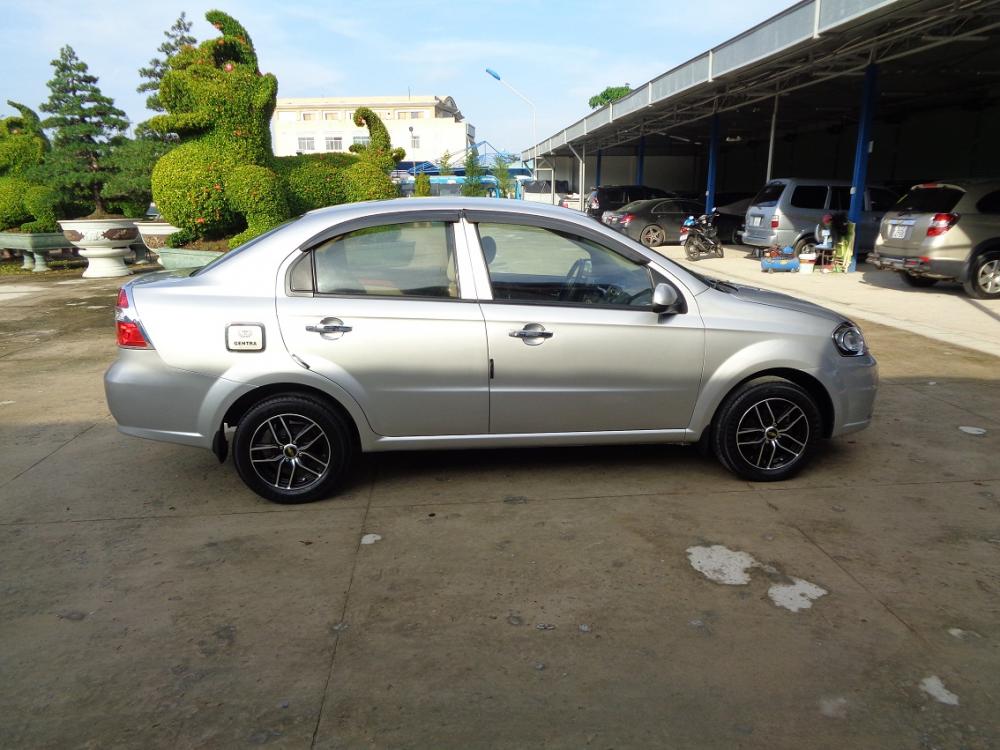 Daewoo Gentra SX 2011 - Bán ô tô Daewoo Gentra SX đời 2011, màu bạc, xe đẹp