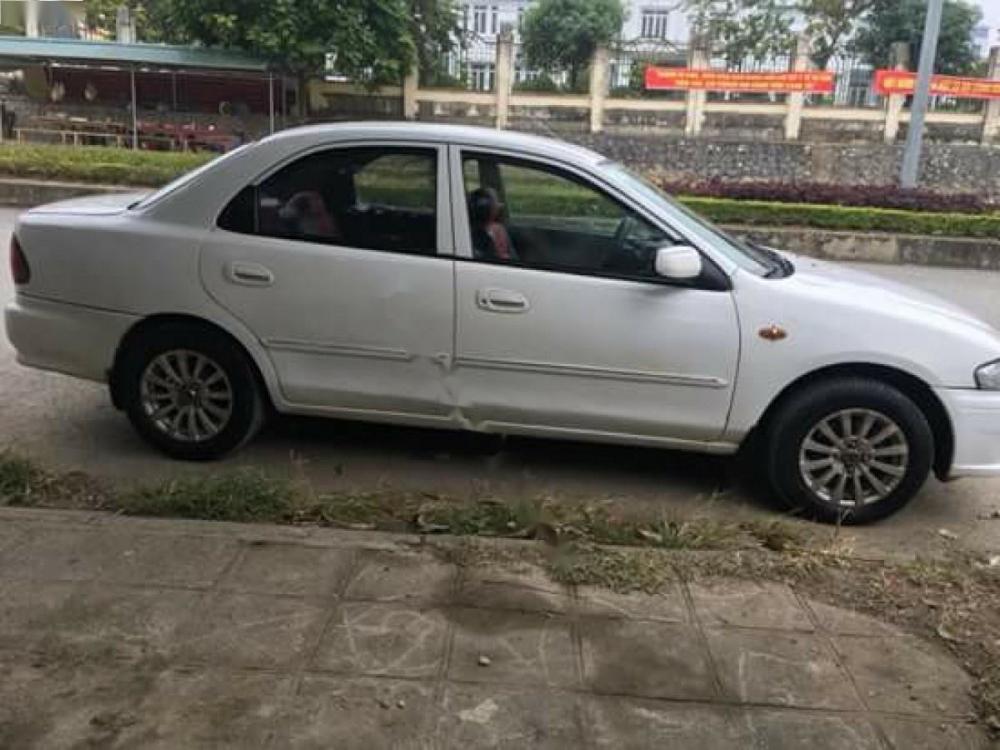 Mazda 3 2000 - Cần bán Mazda 3 đời 2000, màu trắng, giá 76tr