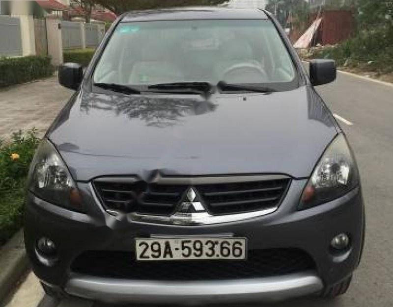 Mitsubishi Zinger GLS Limited 2.4 MT 2011 - Cần bán lại xe Mitsubishi Zinger đời 2011, màu đen số sàn, giá 368tr