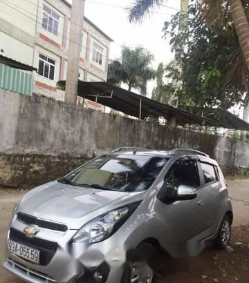 Chevrolet Spark   LTZ 1.0AT 2015 - Bán Chevrolet Spark LTZ 1.0AT đời 2015, màu bạc số tự động