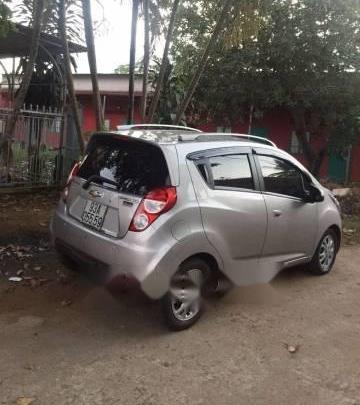 Chevrolet Spark   LTZ 1.0AT 2015 - Bán Chevrolet Spark LTZ 1.0AT đời 2015, màu bạc số tự động