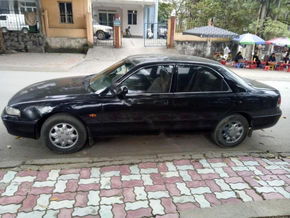 Mazda 626 2.0 MT 1995 - Bán Mazda 626 2.0 MT sản xuất 1995, màu đen, nhập khẩu chính chủ, giá chỉ 100 triệu