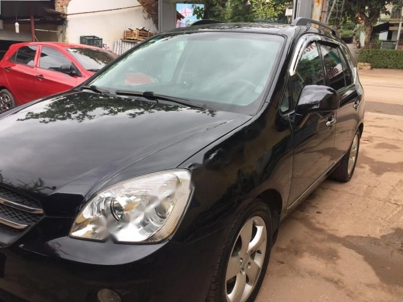 Kia Carens 2009 - Bán Kia Carens đời 2009, màu đen số tự động, 360tr