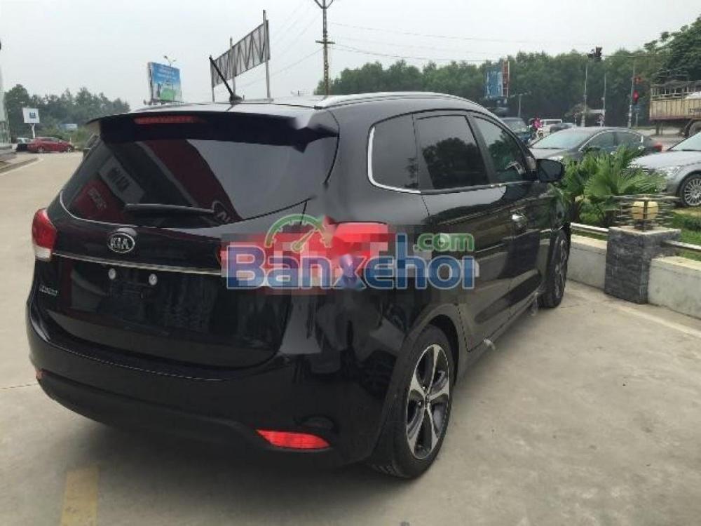 Kia Rondo GAT  2015 - Cần bán lại xe Kia Rondo GAT đời 2015, màu đen ít sử dụng, 590 triệu